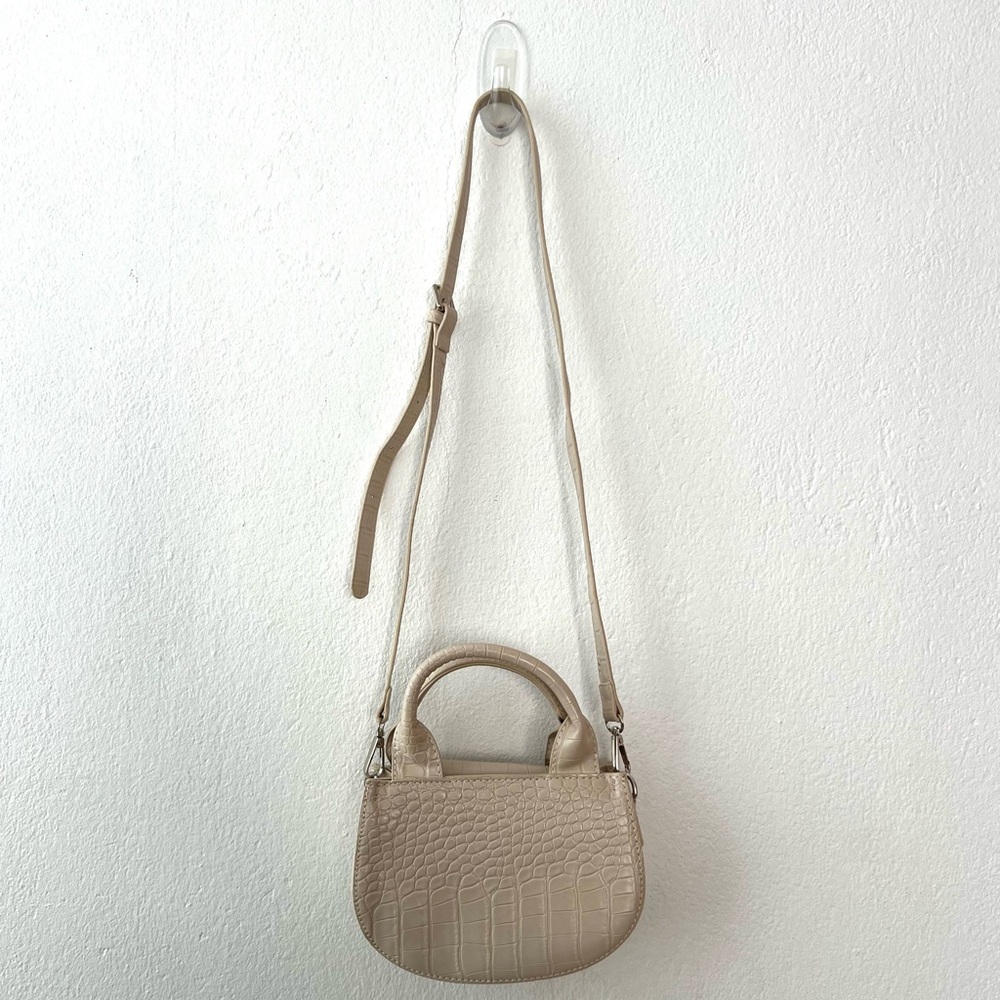 Cream and tan mini shoulder bag with adjustable strap